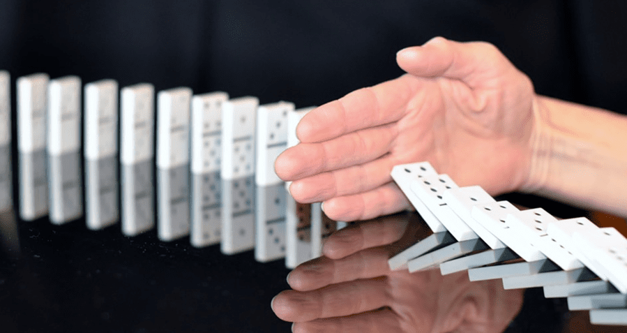 stopping dominoes from falling